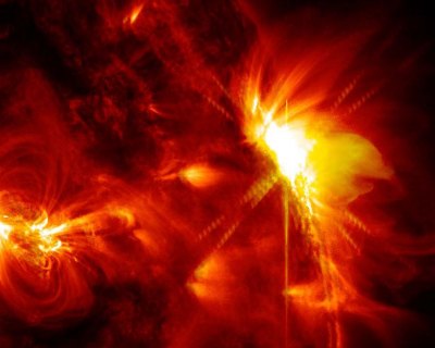 A solar flare erupts on the far right side of the sun in this image captured by NASA's Solar Dynamics Observatory. The flare peaked at 6:34 p.m. EDT on March 12. Image: NASA.